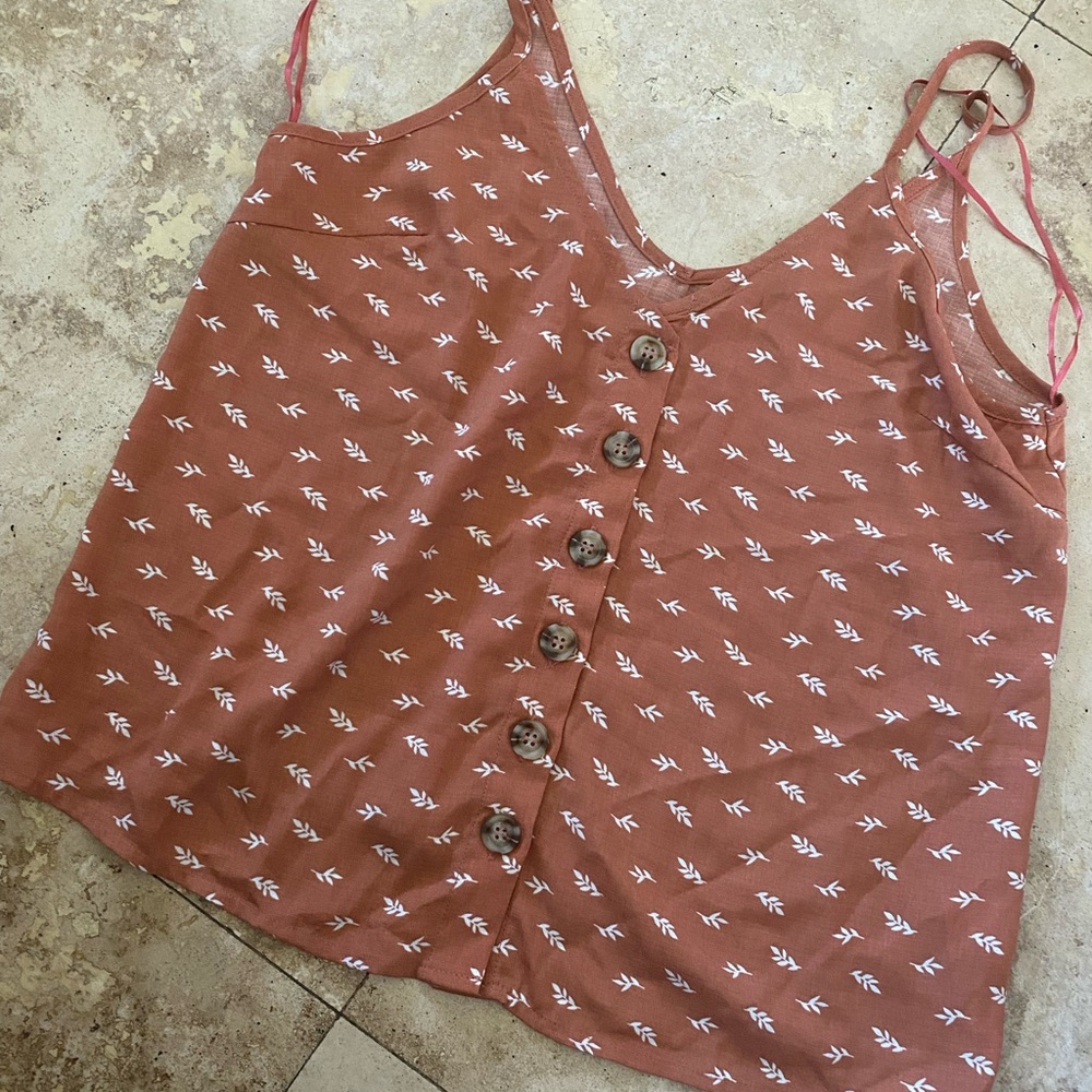 NWOT Beautiful top. Wore for modeling for store